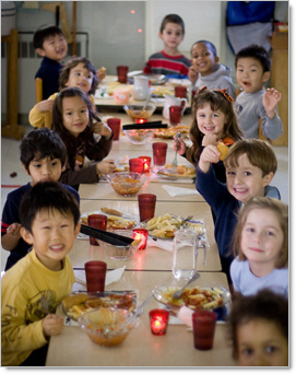 kindergarten kids smilling at snack time